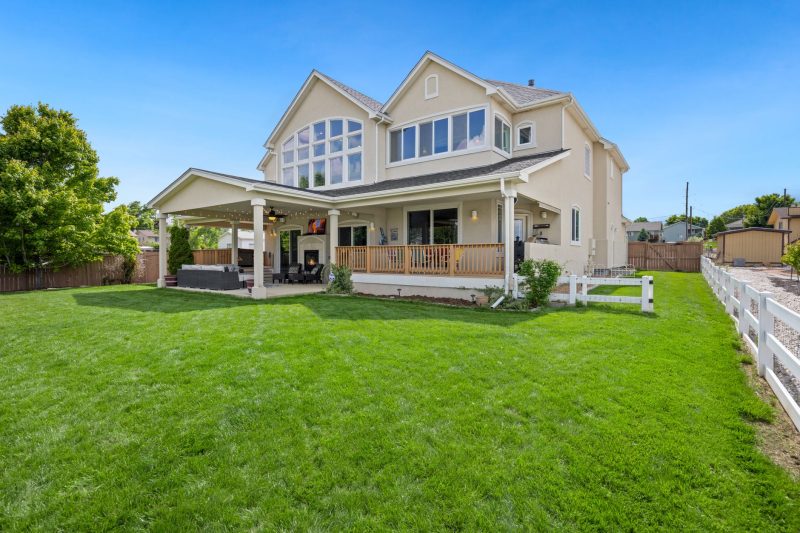 Home 23 Beautiful twostory suburban house with a large green lawn an 1783443846