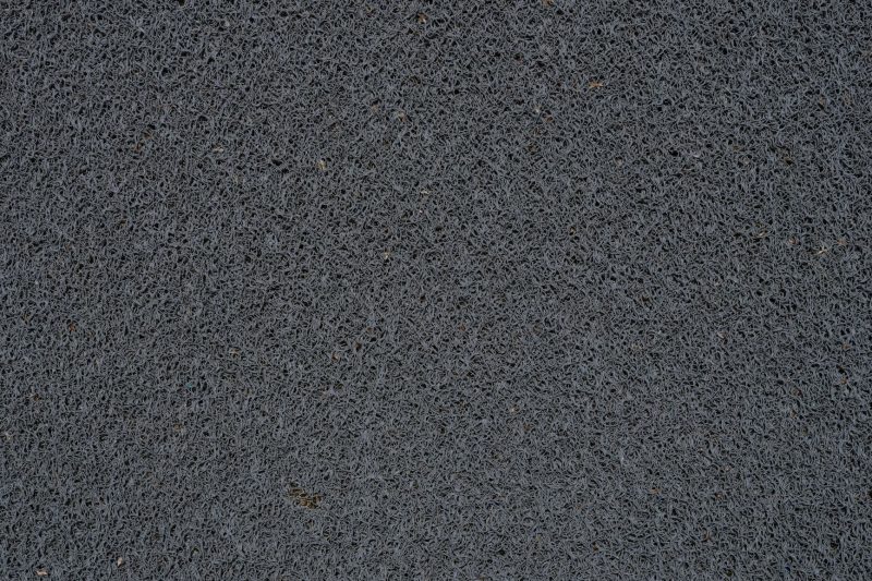 Home 23 Detailed view of a gray synthetic doormat showcasing its fib 1786467764