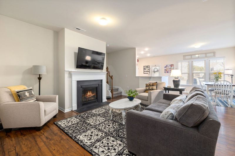 Home 20 Spacious living room featuring a fireplace TV and comfortabl 1790701286